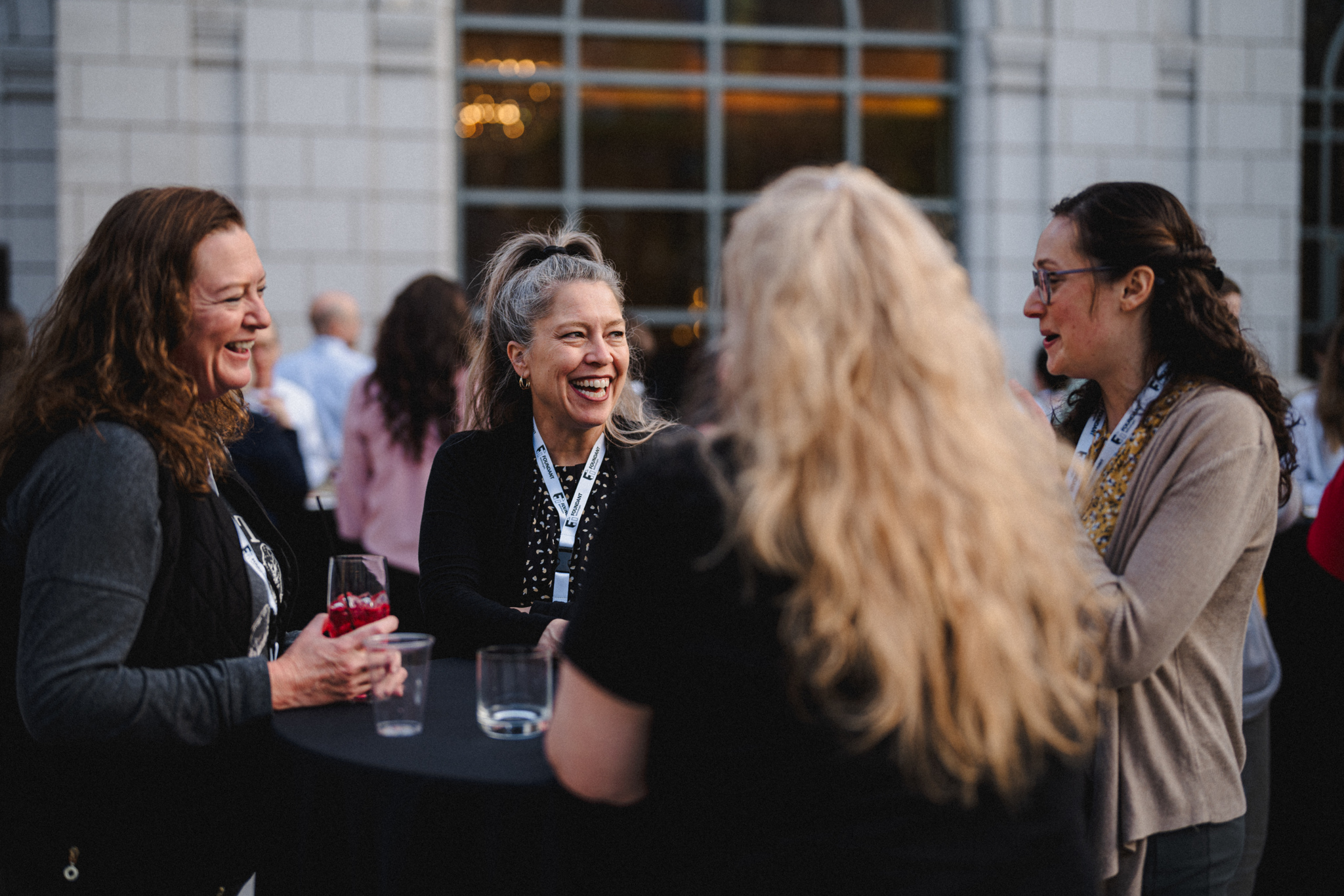 People smiling and talking